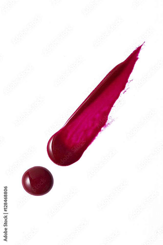 Red color lip gloss drop paint on background Red color lip gloss drop paint on background