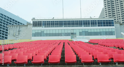 Red color of many grandstand out door stadium of soccer,football