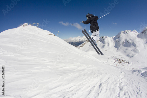 Wallpaper Mural Ski rider jumping on mountains. Extreme ski freeride sport. Torontodigital.ca