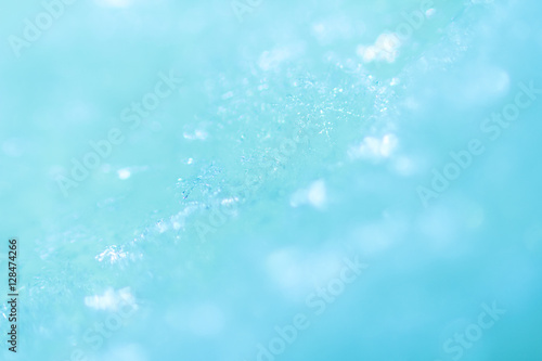 Snow bright abstract winter background close-up bokeh