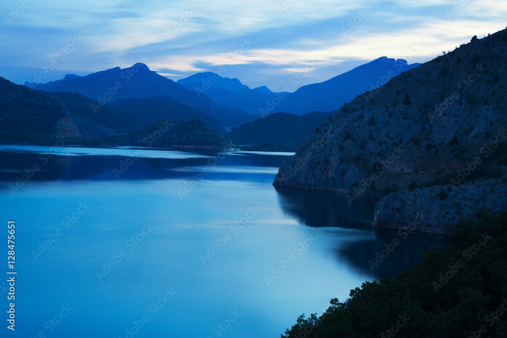 mountain reservoir in  twilight