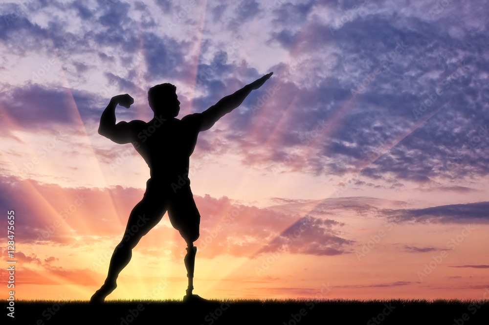 Paralympic bodybuilder with prosthetic leg sunset Paralympic bodybuilder with prosthetic leg sunset
