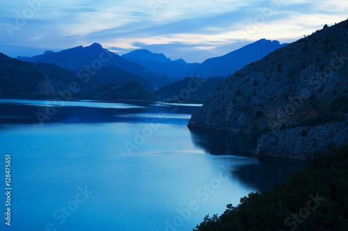 mountain reservoir in twilight