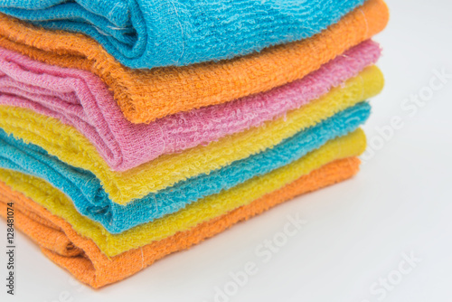 Closeup Colorful Beautiful towels on White background .