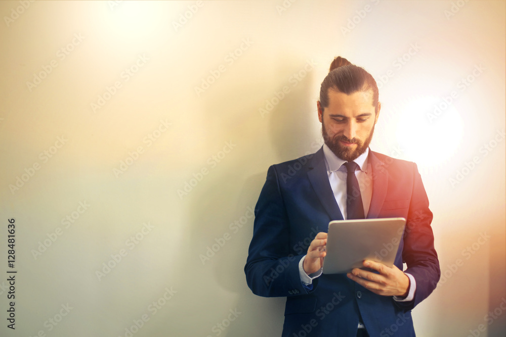 Bearded businessman with tablet Bearded businessman with tablet