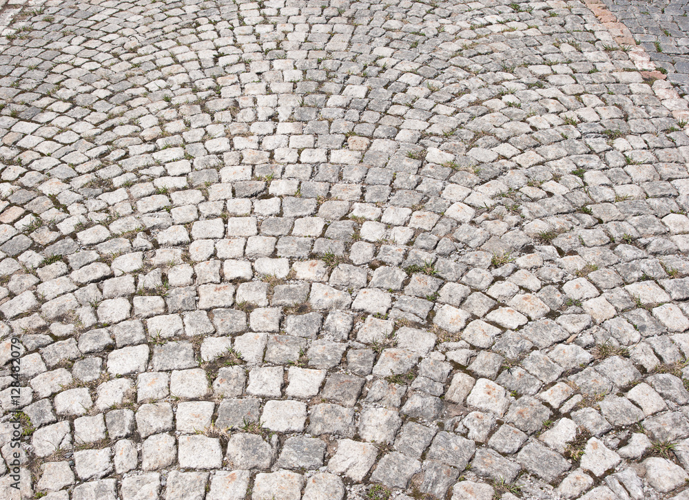 Texture of old cobblestone pavement.