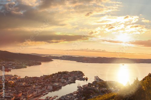 View of Bergen against golden sunset from Floyen in Norway photo