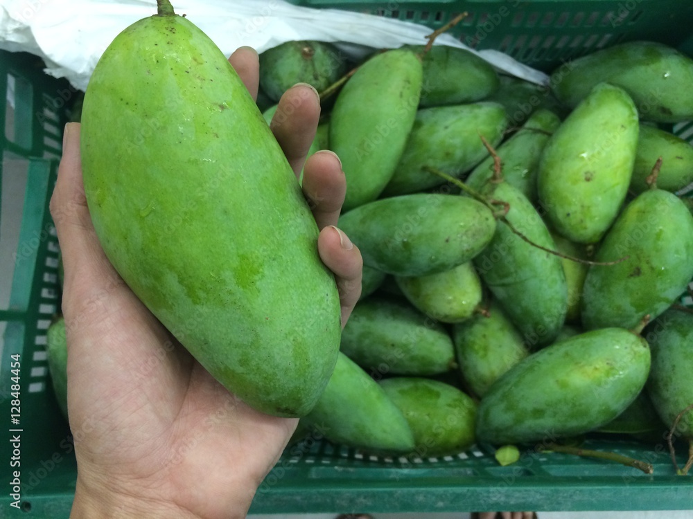 Green mango in the market / Mobile photography