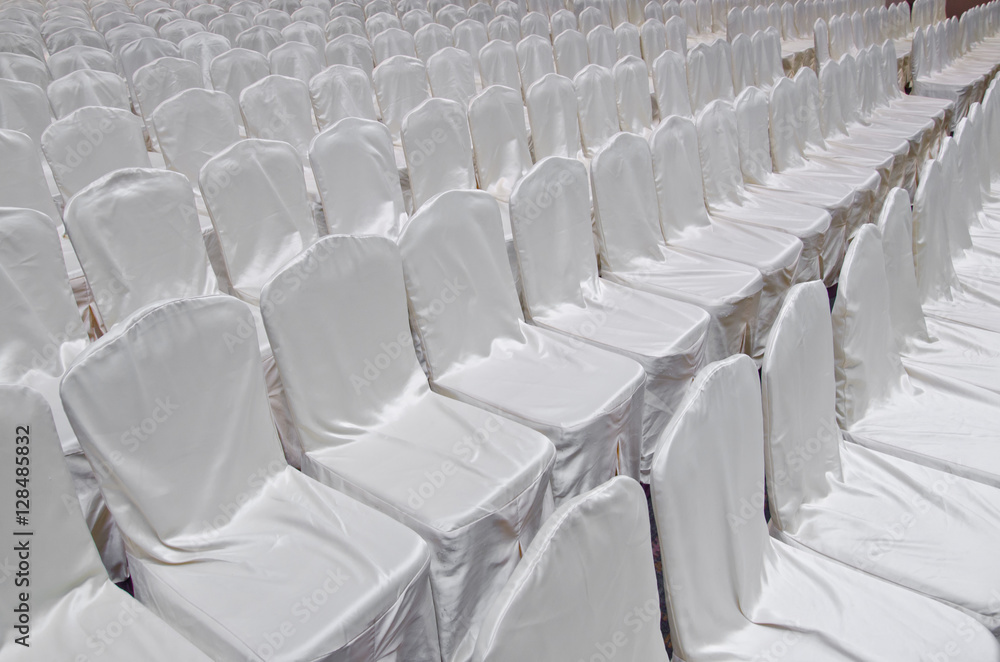 Fototapeta premium group White chair in big room