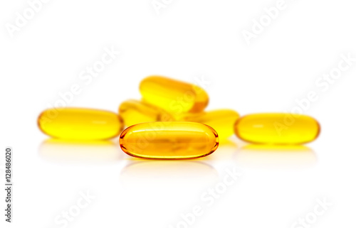Fish oil supplement capsules isolated on white background