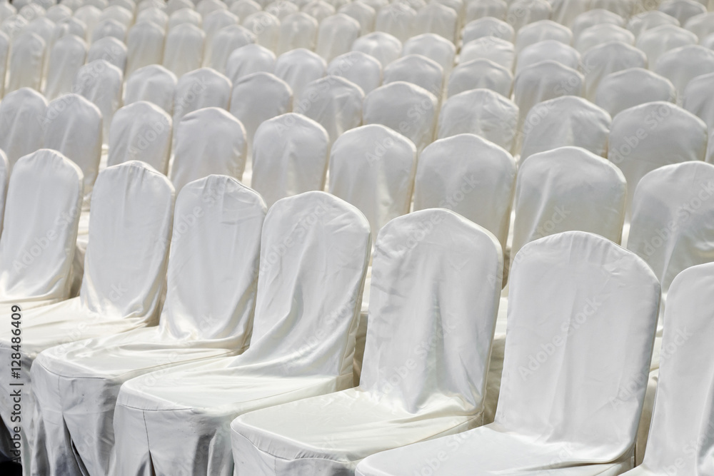 Fototapeta premium group White chair in big room