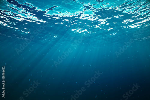 3d rendering underwater with sunrays and in deep tropical sea. © rost9