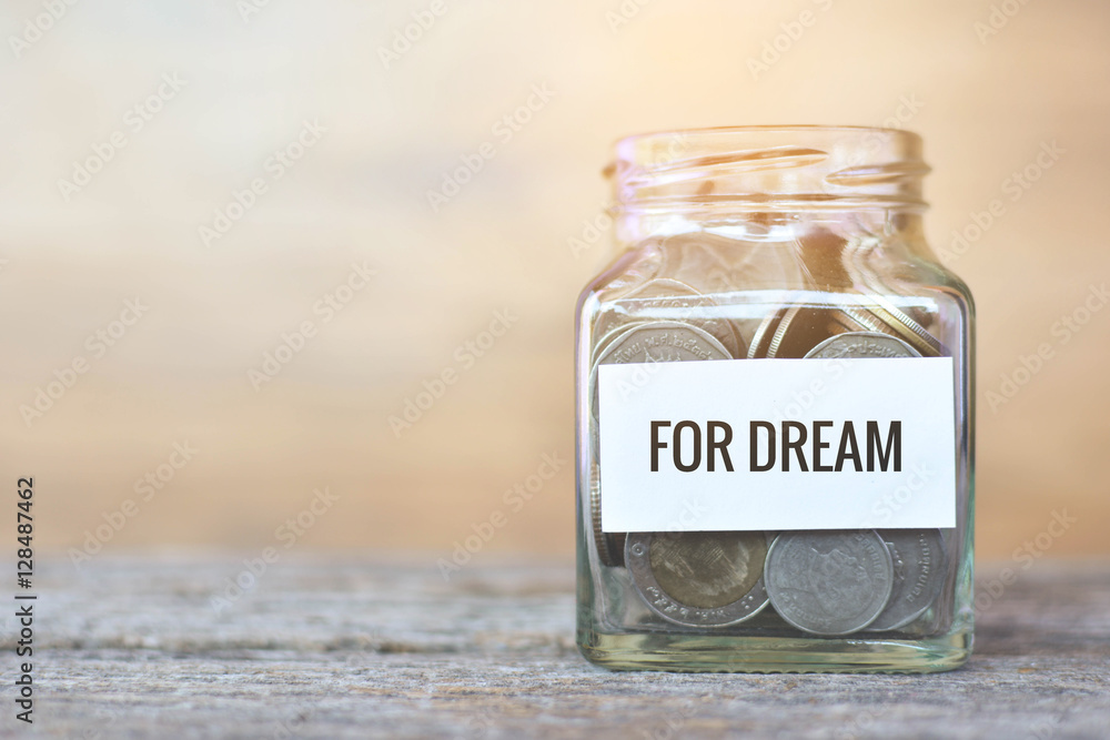 Money in a glass jar with Money in a glass jar with