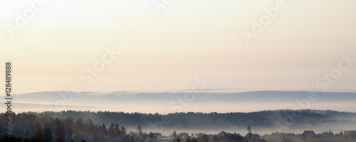  delicate haze of morning mist over the valley. hilly landscape. Savannah, grassland . used toning of the photo © Евгений Кожевников