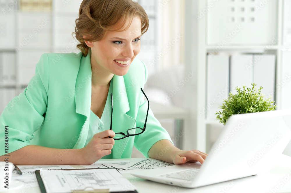 Woman working on laptop Woman working on laptop