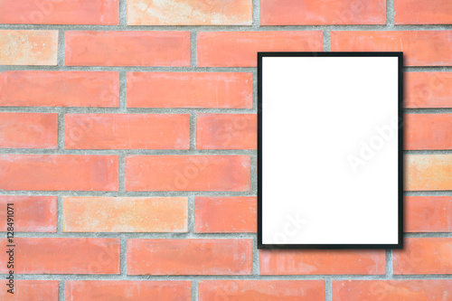 Wallpaper Mural Mock up blank poster picture frame on brick wall. Torontodigital.ca