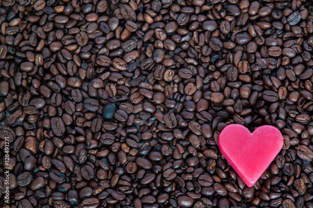 Red soap heart on coffee beans Red soap heart on coffee beans