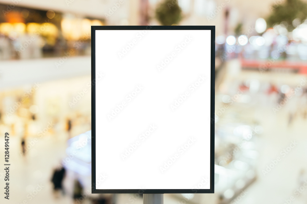 Blank sign with copy space for your text message or mock up content in modern shopping mall. Blank sign with copy space for your text message or mock up content in modern shopping mall.