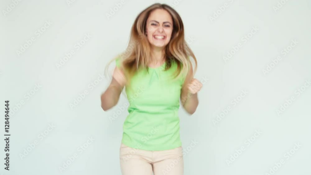 Surprise and joy. Portrait cheerful girl 20 years old teenager laughing at camera on white background Surprise and joy. Portrait cheerful girl 20 years old teenager laughing at camera on white background