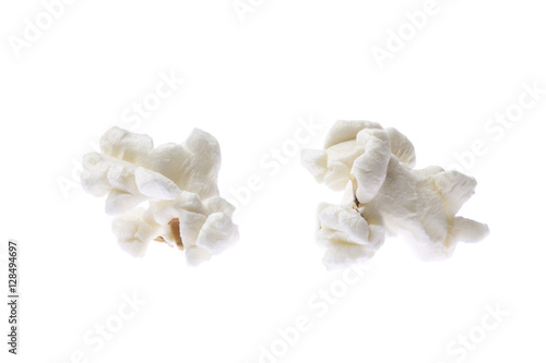 Extreme macro of two popcorns on white background