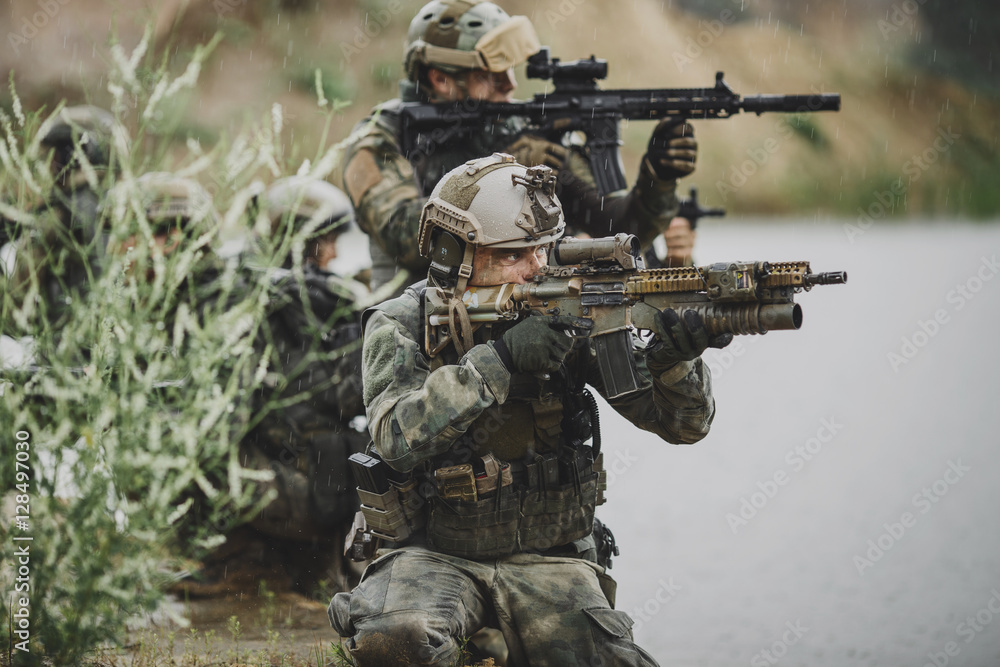 Portrait of a ranger in the battlefield with a gun