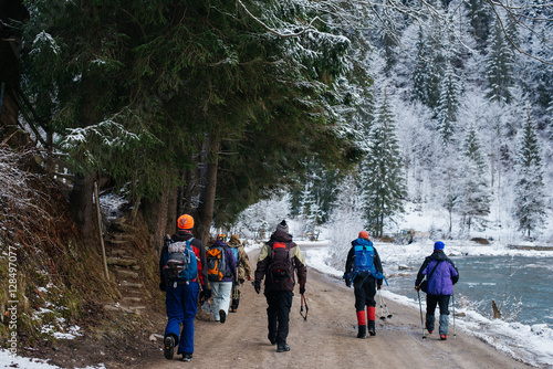 Group of friends trekking in winter mountains © iradzvonkovska