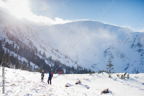 Extreme boys climb the mountain for downhill skiing © iradzvonkovska
