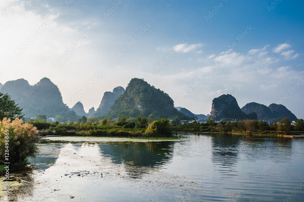 The karst mountains and river scenery in the evening 