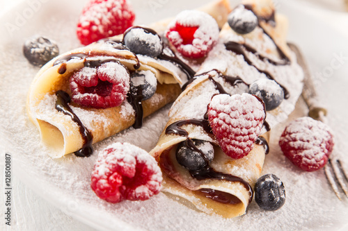 Pancakes with berries and m...
