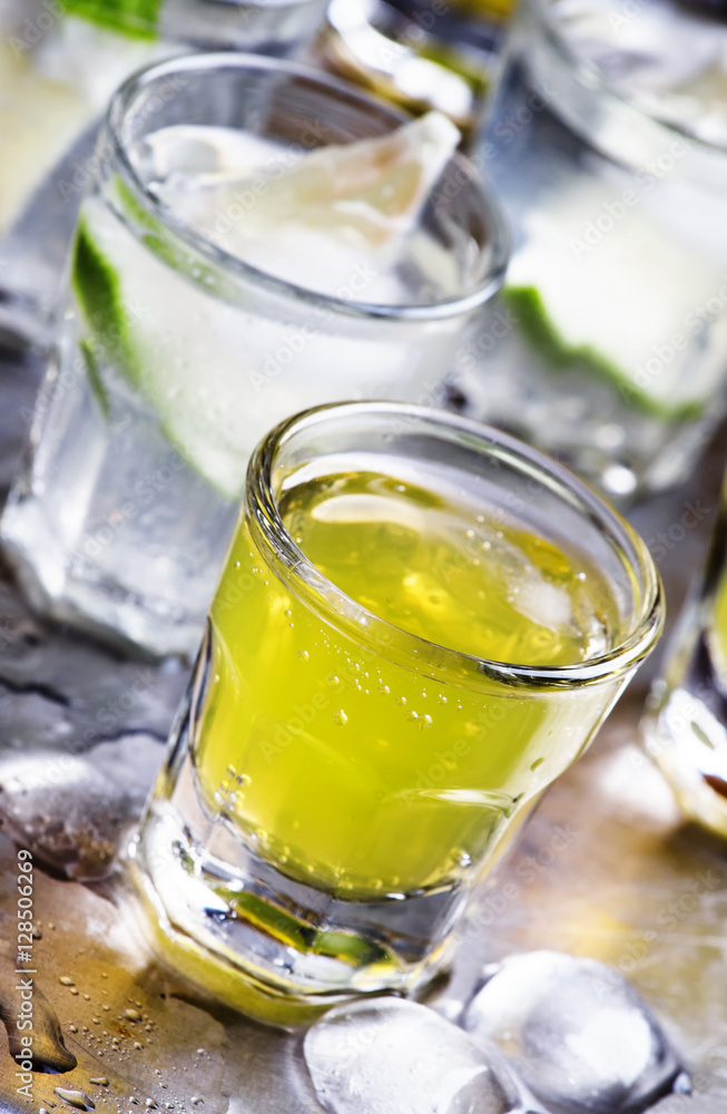 Various cocktails with fruit juice and alcohol, steel background Various cocktails with fruit juice and alcohol, steel background
