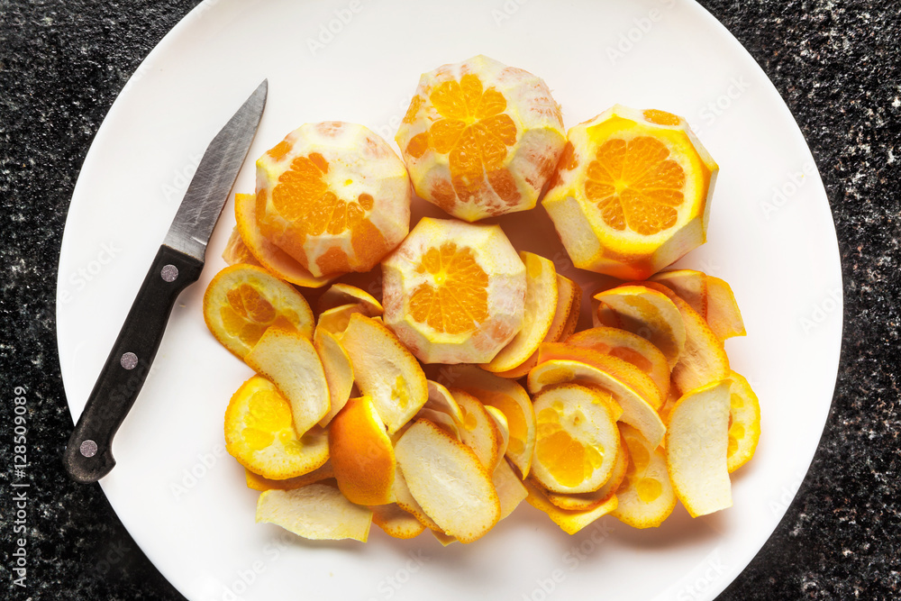 peeled oranges, ready for squeezing of juice