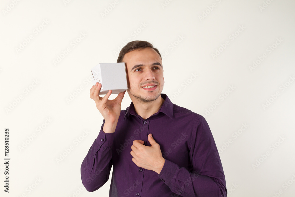 Man with small gift box. He presents it. Man with small gift box. He presents it.