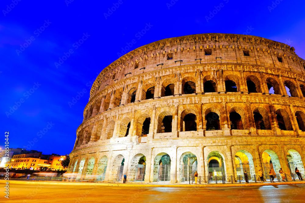 View of Colosseum at night in Rome, Italy