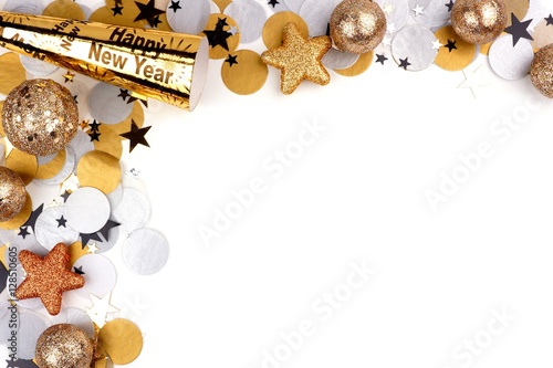Fotografia, Obraz New Years Eve corner border of confetti and decor isolated on a white background
