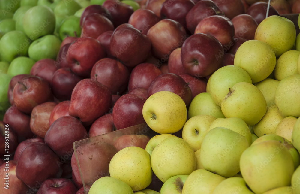 Fresh apples in supermarkets. Fruit background. Healthy eating. Fall harvest, agricultural farming concept (selective focus) Fresh apples in supermarkets. Fruit background. Healthy eating. Fall harvest, agricultural farming concept (selective focus)