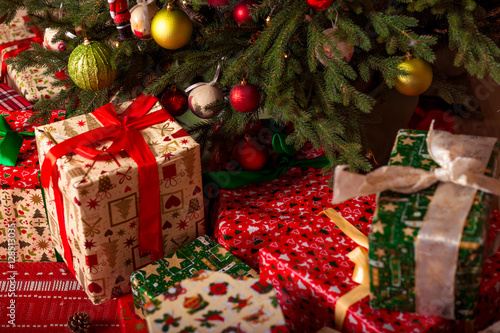 Christmas gifts under the tree. New Year home interior