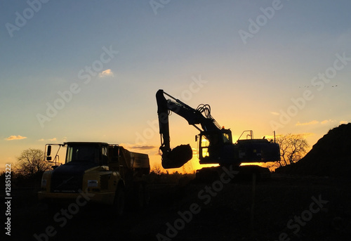 Excavator during sunset