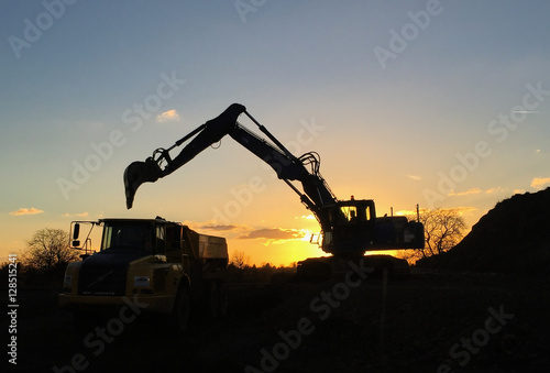 Excavator during sunset