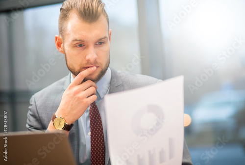    Portrait of a businessman reading a document