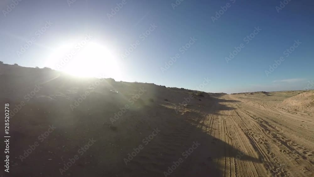 Small van driving in the sand - Morocco Small van driving in the sand - Morocco