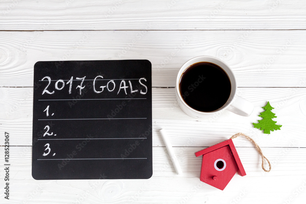 notebook and goals for new year wooden background top view notebook and goals for new year wooden background top view
