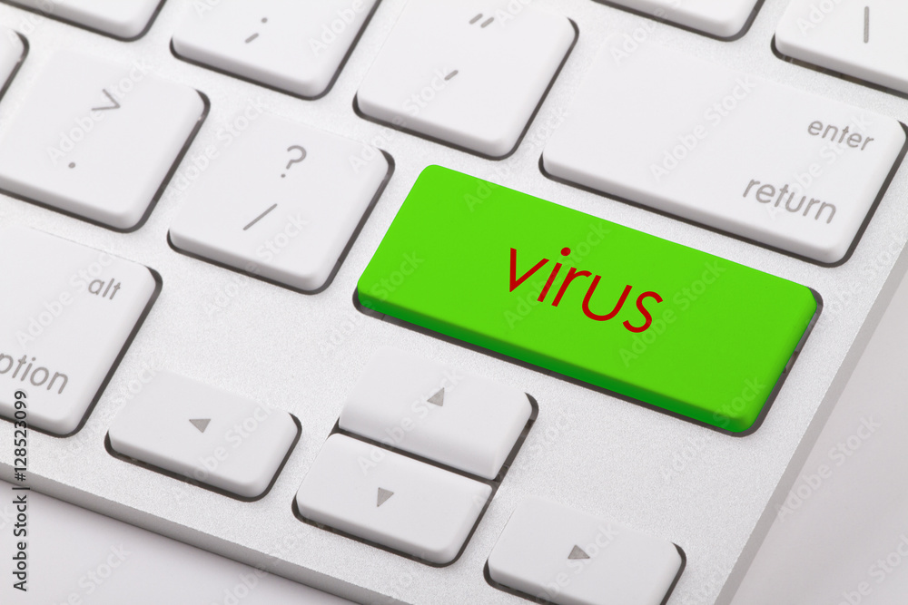 Virus word written on computer keyboard. Virus word written on computer keyboard.