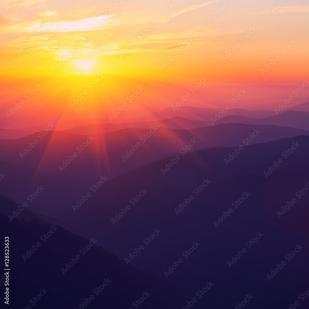 Silhouettes of the mountain hills at sunset Silhouettes of the mountain hills at sunset