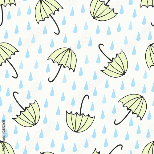 Seamless pattern with hand drawn umbrellas and rain drops in blue and yellow on cream background.