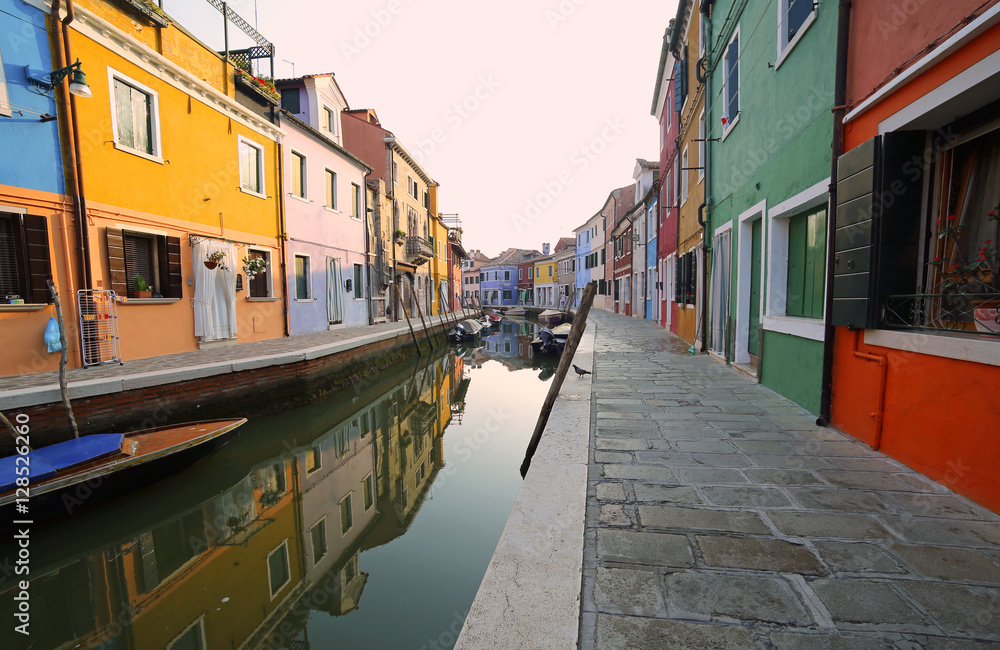 beautiful reflections of the colourful houses of Burano near Ven