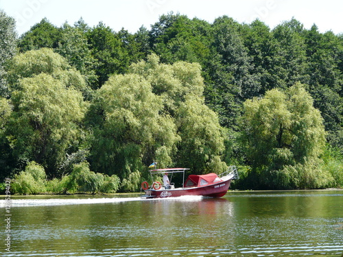 Canvas Print the boat on a river