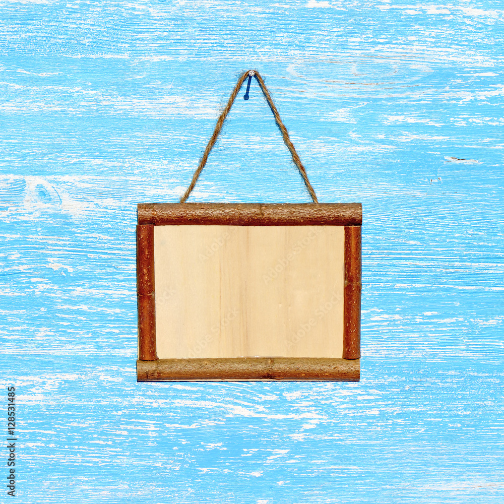 Wooden sign board blank frame on old blue wood background Stock Photo