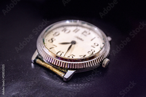 Vintage Old Wrist Watch on a uniform dark background
