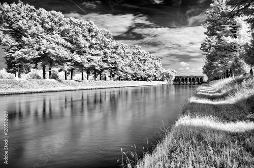 infrared long exposure forest, river and dike