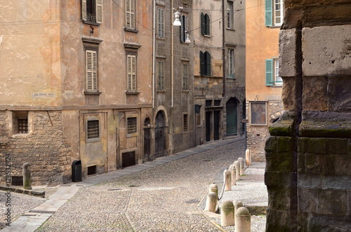 Bergamo, Italy-October 4,2014: Street in historic center with ancient buildings in Citta ALta of Bergamo, Italy.